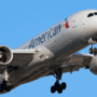 a plane flying in the sky