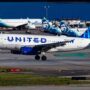 A united airlines airbus a319 landing in front of several Alaska Airlines airplanes